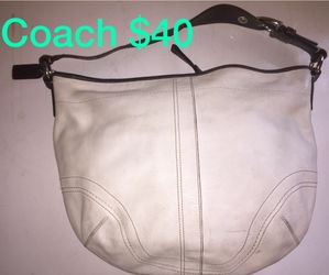 Bolsa coach tamaño mediando