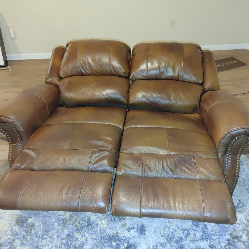In STORAGE, Ready For Pick-up!  Reclining love seat Powered