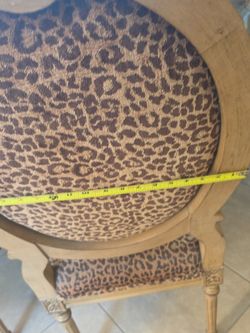 Four beautiful leopard print chairs