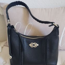 Black leather handbag is a Brighton