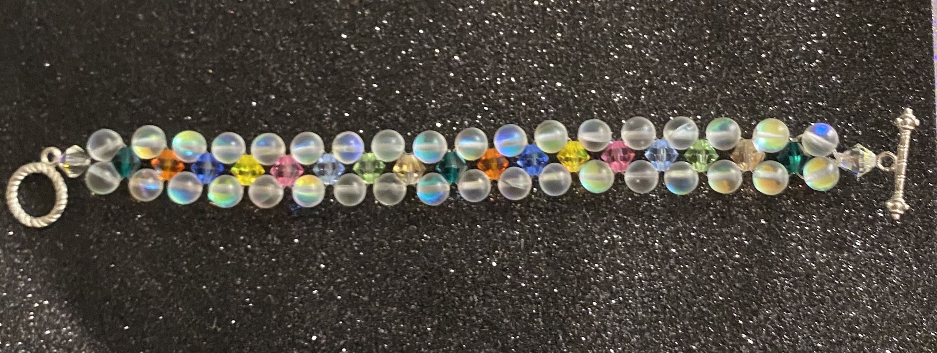 7” Moonstone & Swarovski crystal bicone multicolor bead bracelet.