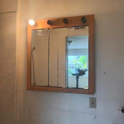 Mirrored And Light Fixture For Bathroom