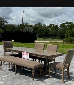 Dinning room table with 4 chairs and 1 bench