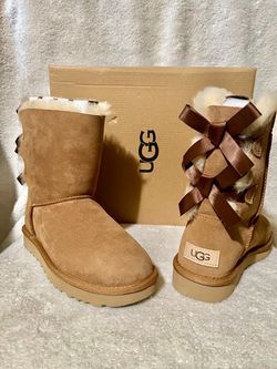 New Ugg woman’s size 8 Bailey bow ll chestnut
