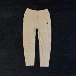 NIKE TECH COMMUTER PANTS SIZE MEDIUM