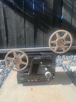 This is a vintage Chinon Sound 7500 Super 8mm movie projector.