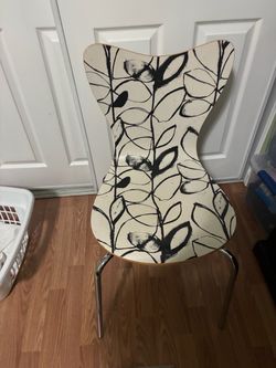 Molded Chair with Black Leaf Print