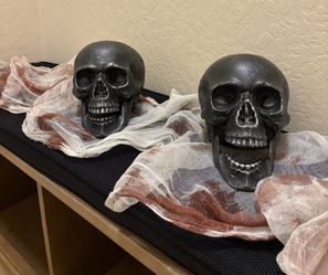 2 Black Skull Heads Mouth Opens & Bloody Fabric $15