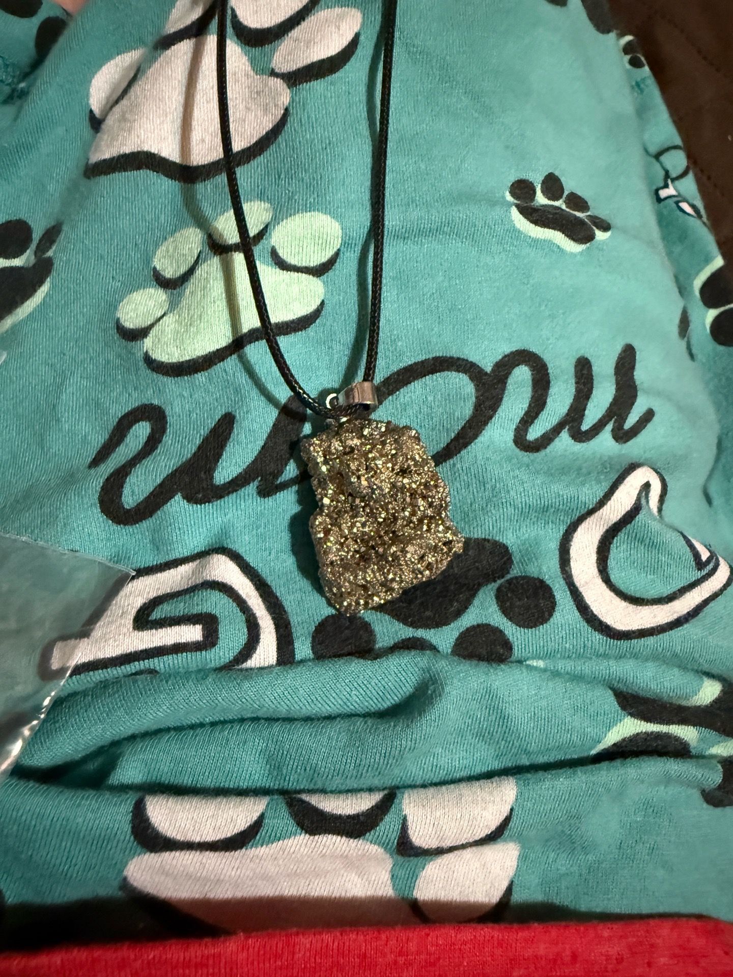 Pyrite/fool’s gold necklace on rope chain.