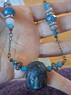 Artisan crafted Buddha head beaded necklace
