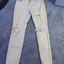 Tan ripped american eagle jeans 