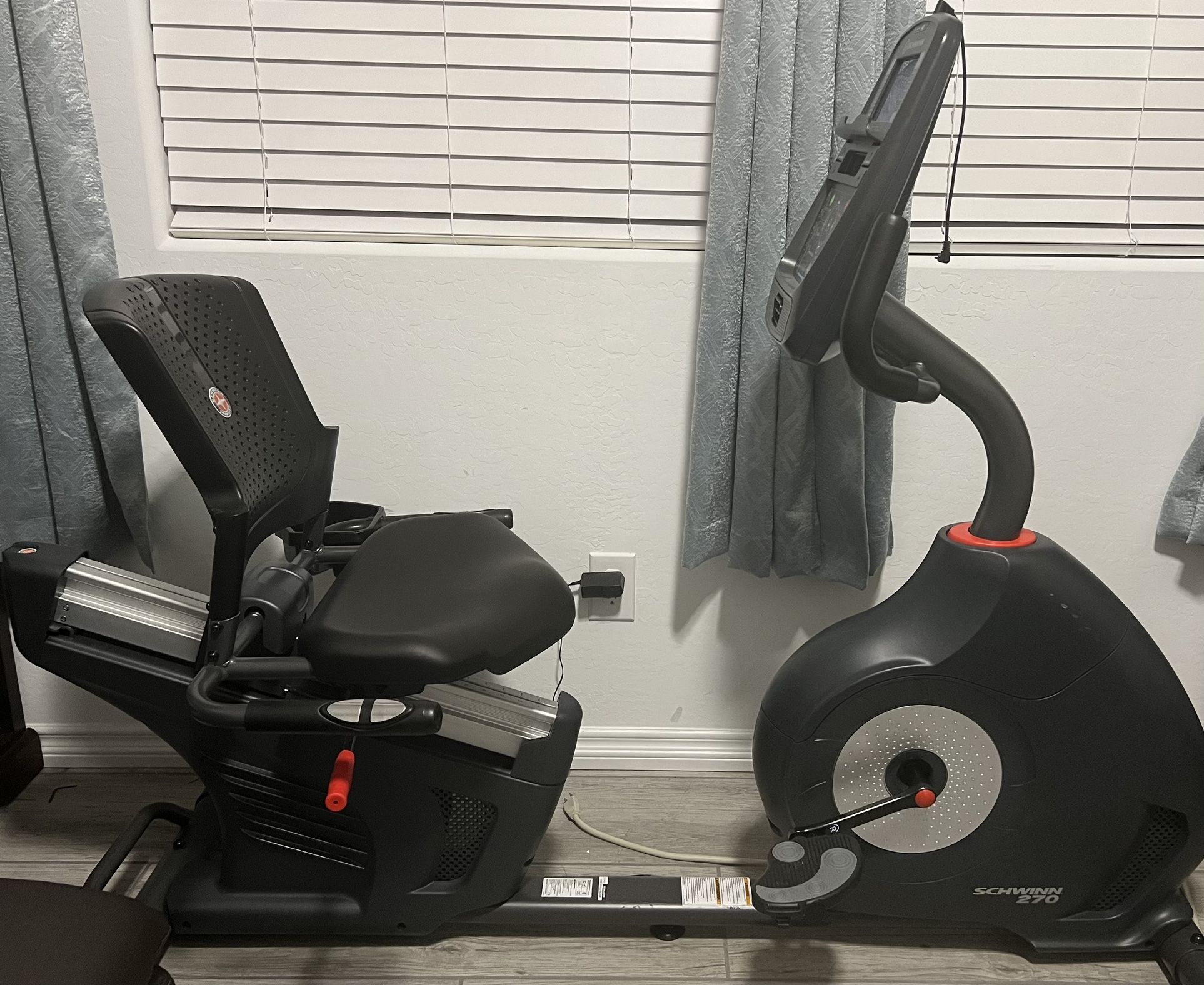 Schwinn 270 Recumbent Bike 66” X 29” X 50”