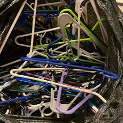 BAG OF PLASTIC HANGERS 