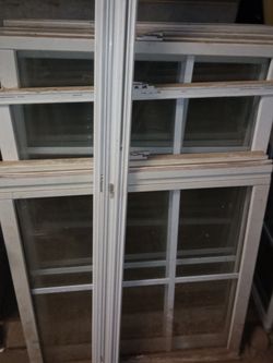 assortment of used windows wood frames