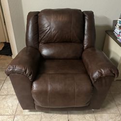 Brown leather rocker Recliner 