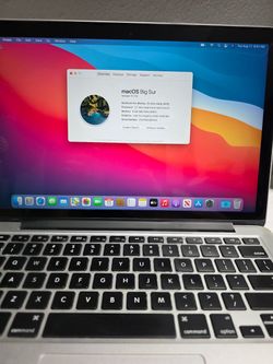 Apple MacBook Pro with a 13-inch Retina display. This laptop has a 2.7 GHz Dual-Core Intel Core i5 processor and 8 GB of 1867 MHz DDR3 memory. It is e