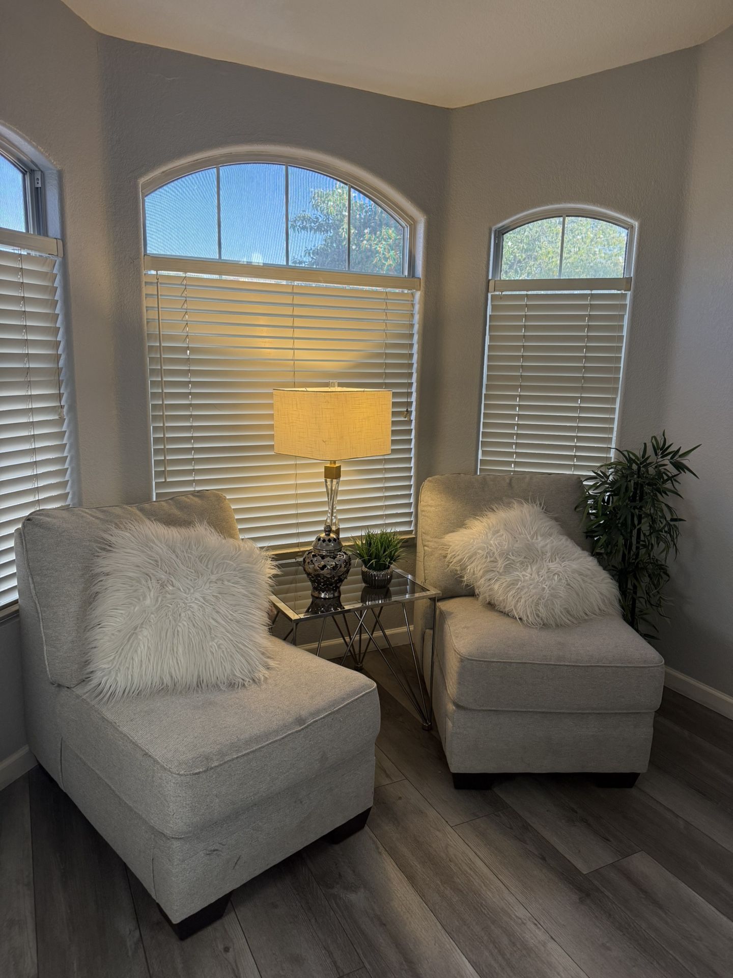 Two Chairs And Silver Table 
