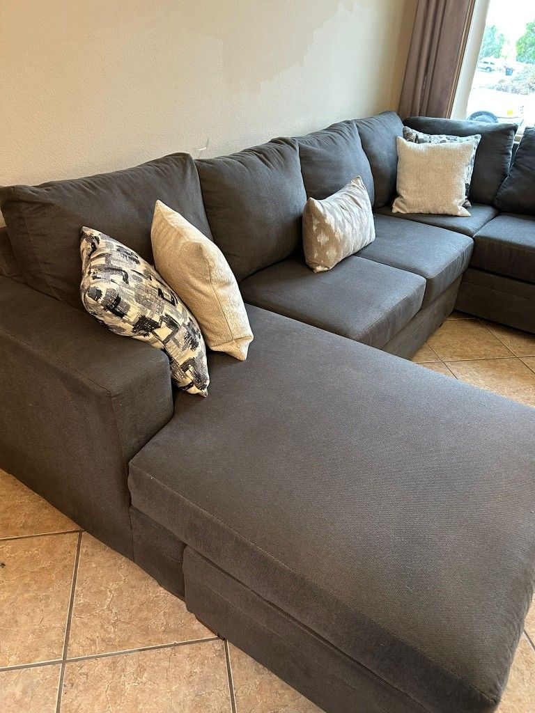 Large And Beautiful Dark Grey Sectional Couch From Living Spaces