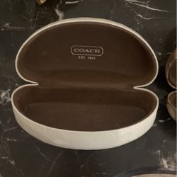 two sunglasses cases Coach