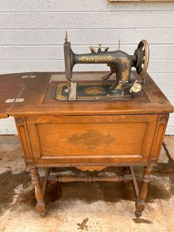New Home Antique Treadle Sewing Machine with Cabinet