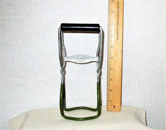Vintage kitchen tool. Canning jar lifter removal tool