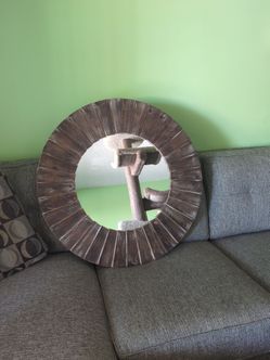 31 1/2" X 3" wooden framed, textured, wall mirror