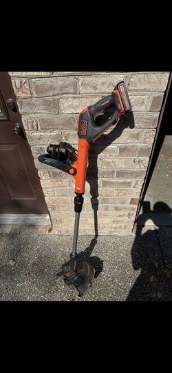 Black & Decker battery powered 20 volt string trimmer with charger and 2 batteries