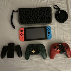Used Nintendo Switch With Charger + Travel Pouch + 3 Controllers