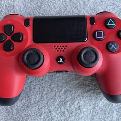 red & black DualShock 4 controller (PlayStation 4)
