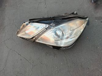2010-2013 Mercedes E Class Sedan headlight (halogen bulb) driver's side.