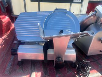 Meat Slicer - Omcan meat slicer, mod 300E, s/n 11449, 12", semi-automatic, w/ top mounted sharpener, 115v, 60hz