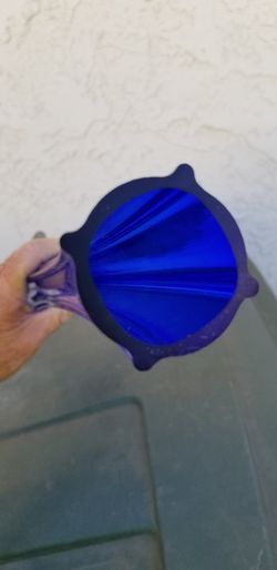 Blue glass bud vase. 20" tall