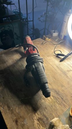 Milwaukee heavy-duty corded rotary hammer drill for sale.