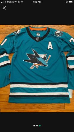 Teal hockey sharks Celebrini jersey