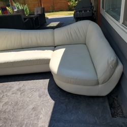 White Leather Sofa. Looks Good 
