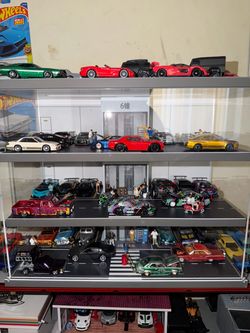 Hot wheels, and garage display 1/64 scale