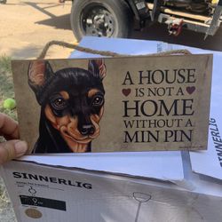 A house is not at home without a min Pin portrait