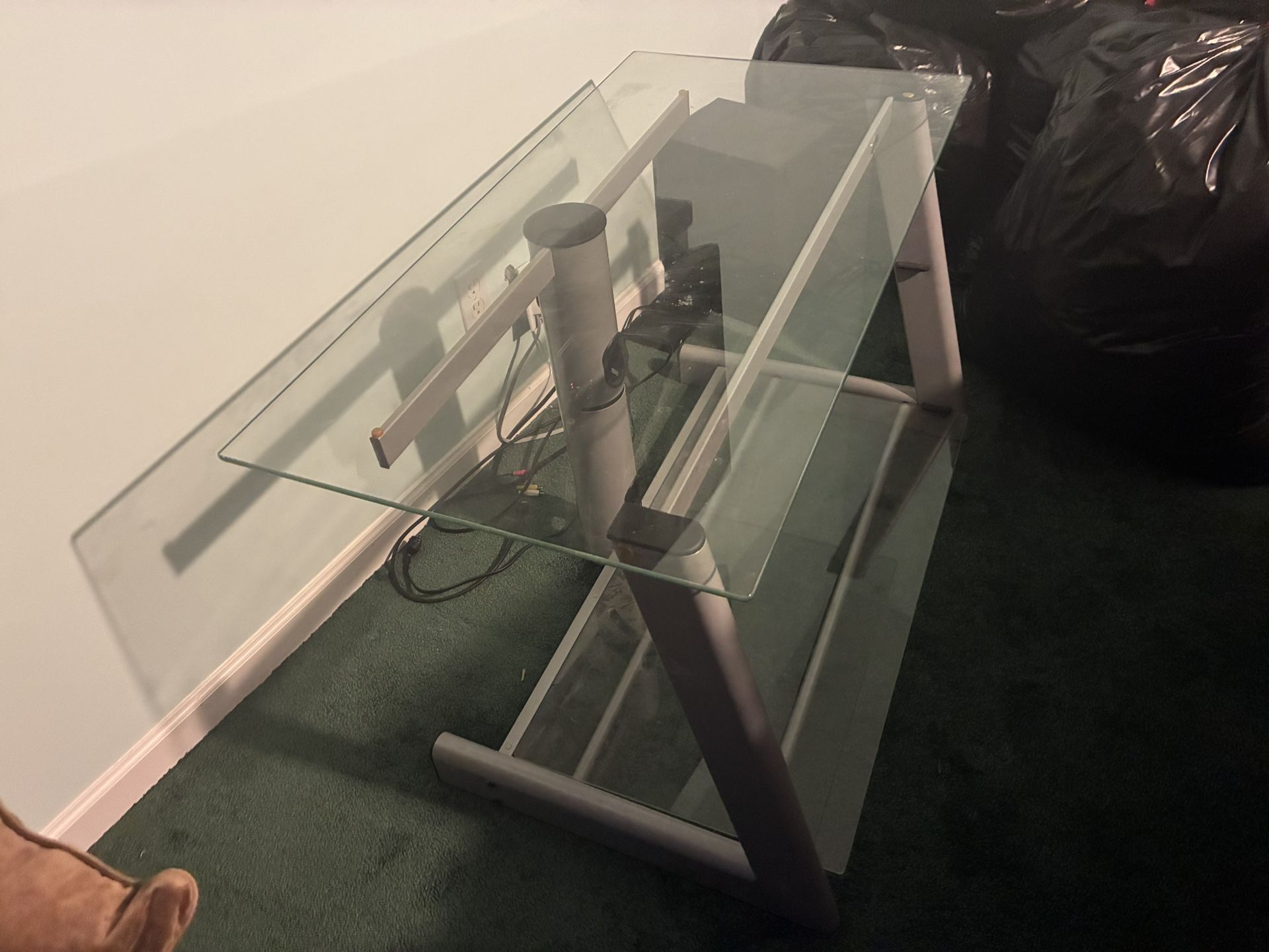 Sleek glass and metal TV stand — modern, sturdy, and perfect for small spaces or apartments