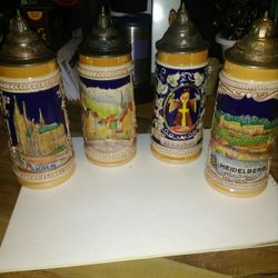 4 Vintage Germans Steins With Silver Lids