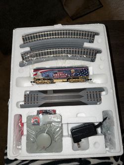 Train car with trump on the side with tracks and motor switch