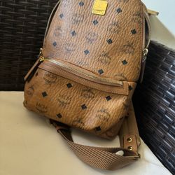 Mcm Sling Backpack 