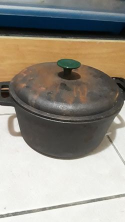 Iron pot with iron lead .