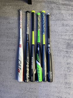Assorted mixed baseball bats. All bats still have life left in them
