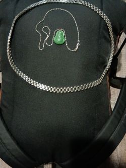 Green Buddha chain and a silver chain