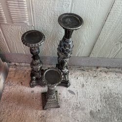 Group of 3  black ornate pillar candle stands