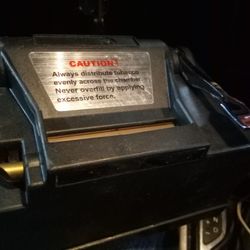 Powermatic II electric cigarette injector machine.