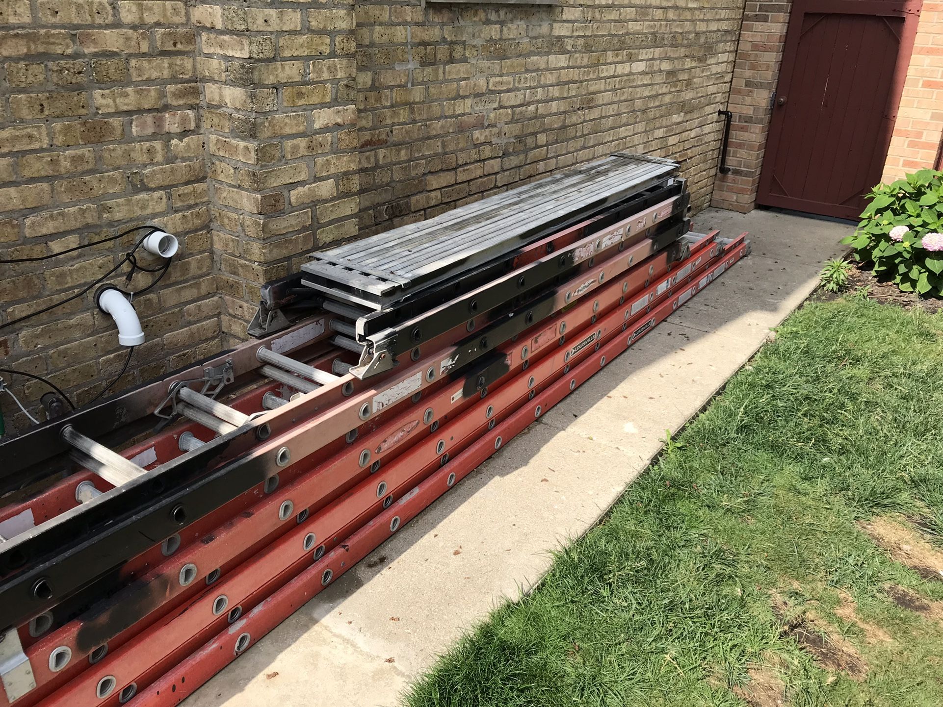 Fiberglass Ladders & Aluminum Extension Planks and Two Ladder Jacks for