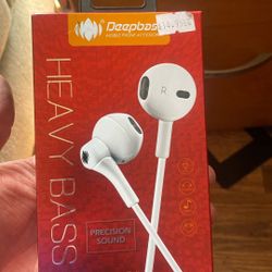 Box Of Wired Earphones,  Two Wireless Chargers , And Few AirPod Cases Gen1