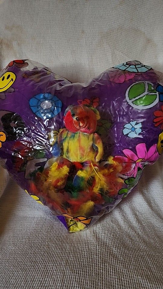 Blow Up Heart Balloon, Feathers And Teddy Bear. Made To Hang And Bring Love And Peace To The World. West or East. And You Can Get More Than One. About