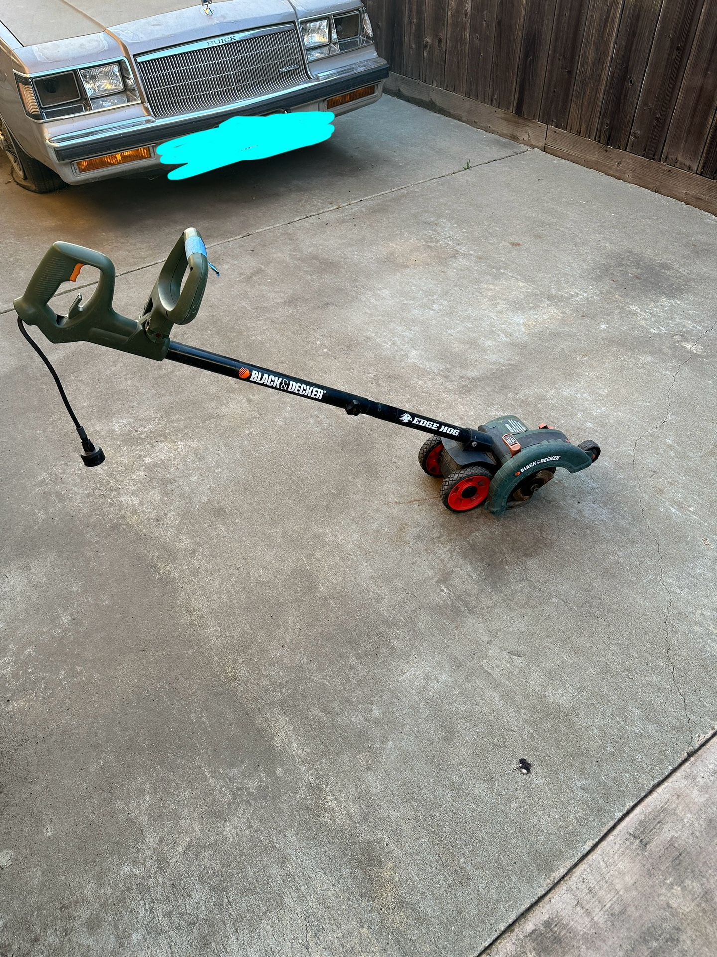 Green And Black Grass Cutter